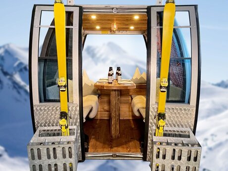 Eine ausgebaute Gondel der alten Komperdellbahn aus Serfaus-Fiss-Ladis in Tirol | © Seilbahn Komperdell GmbH