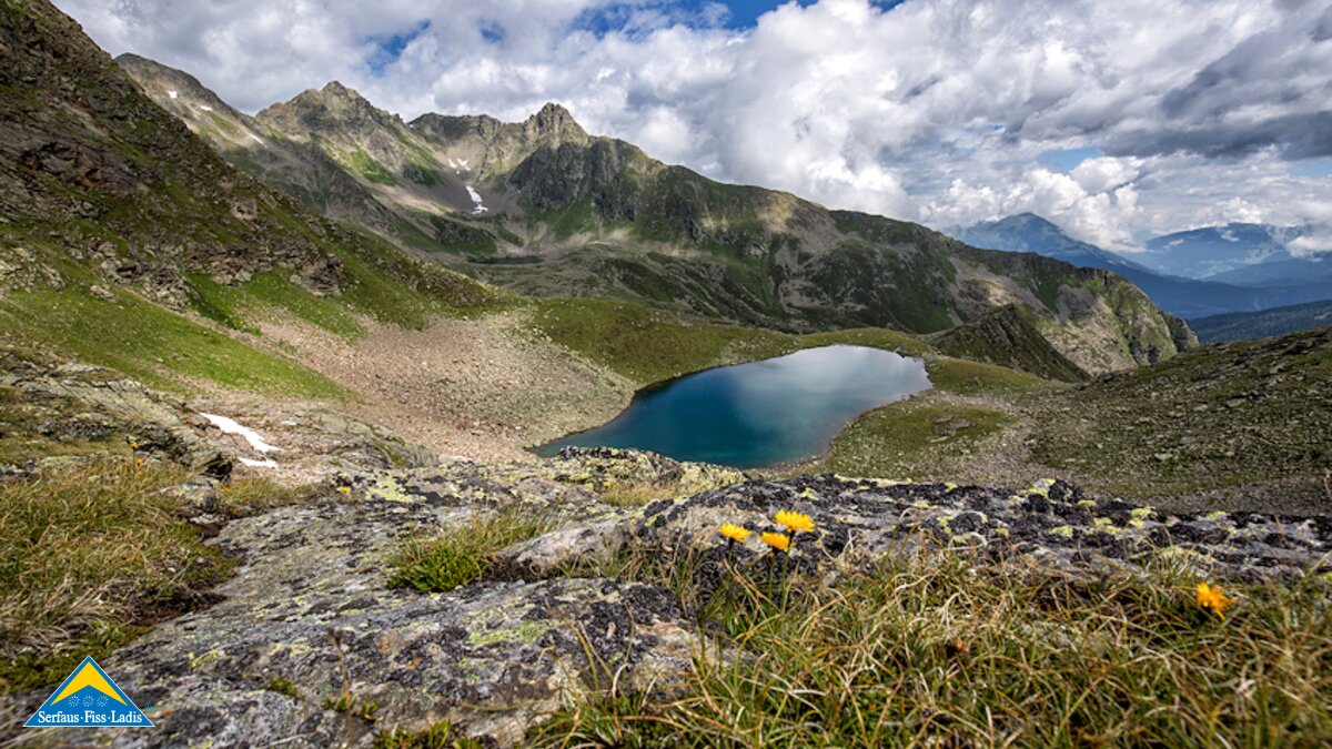 Blick auf den Spinnsee in Fiss in Tirol. Der Spinsee kann bei einer Wanderung in Serfaus Fiss Ladis bewundert werden | © Andreas Kirschner