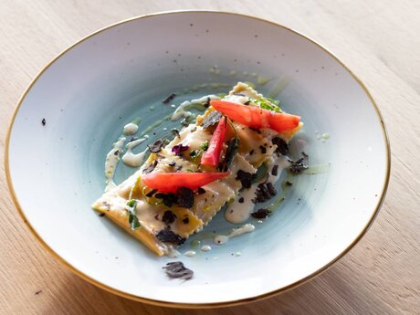 Genuss auf ganzer Linie im Chesa Monte in Fiss in der Familien Region Serfaus-Fiss-Ladis in Tirol Österreich Grüne Haube | © Serfaus-Fiss-Ladis Marketing GmbH | Rene Raggl