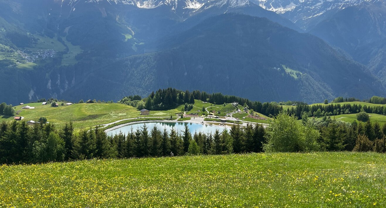 Blauschimmernder Bergsee in der Familien Wander Region Serfaus-Fiss-Ladis in Tirol Österreich | © Serfaus-Fiss-Ladis Marketing GmbH 